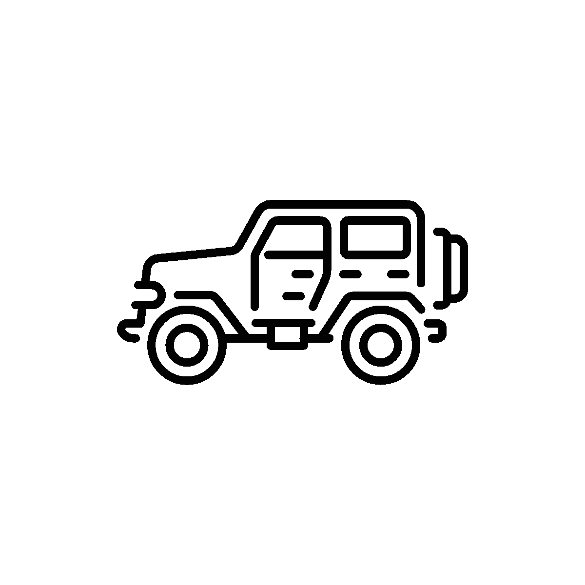 Jeep driving across rough outdoor terrain